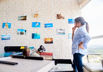 Office with printouts on the wall